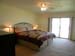 master bedroom w/ king bed